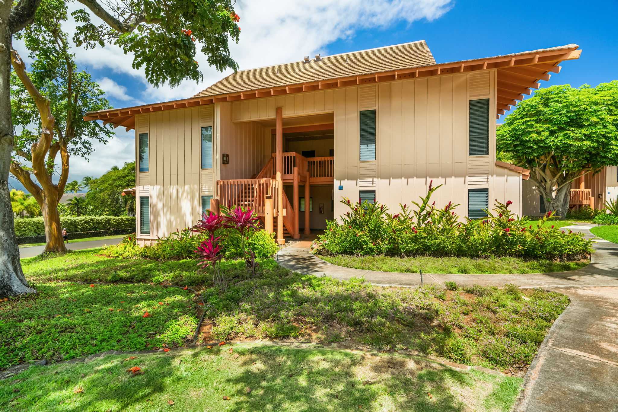 2370 Ho'ohu Road, Unit 712 Koloa, HI 96756 - Photo 23 of 28 a view of a house with a yard