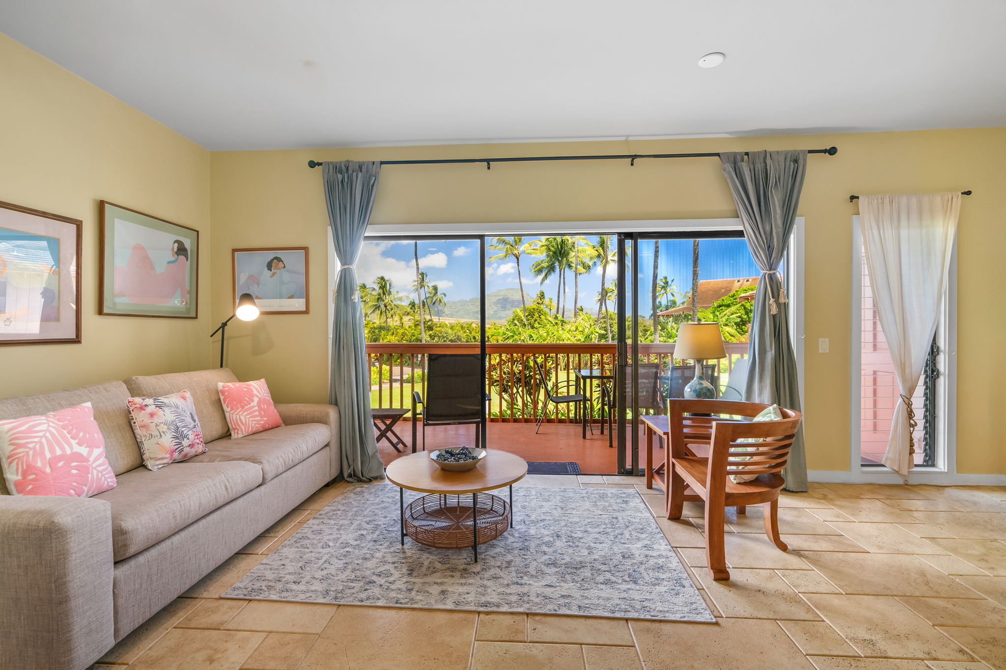 2370 Ho'ohu Road, Unit 712 Koloa, HI 96756 - Photo 3 of 28 a living room with furniture and a potted plant