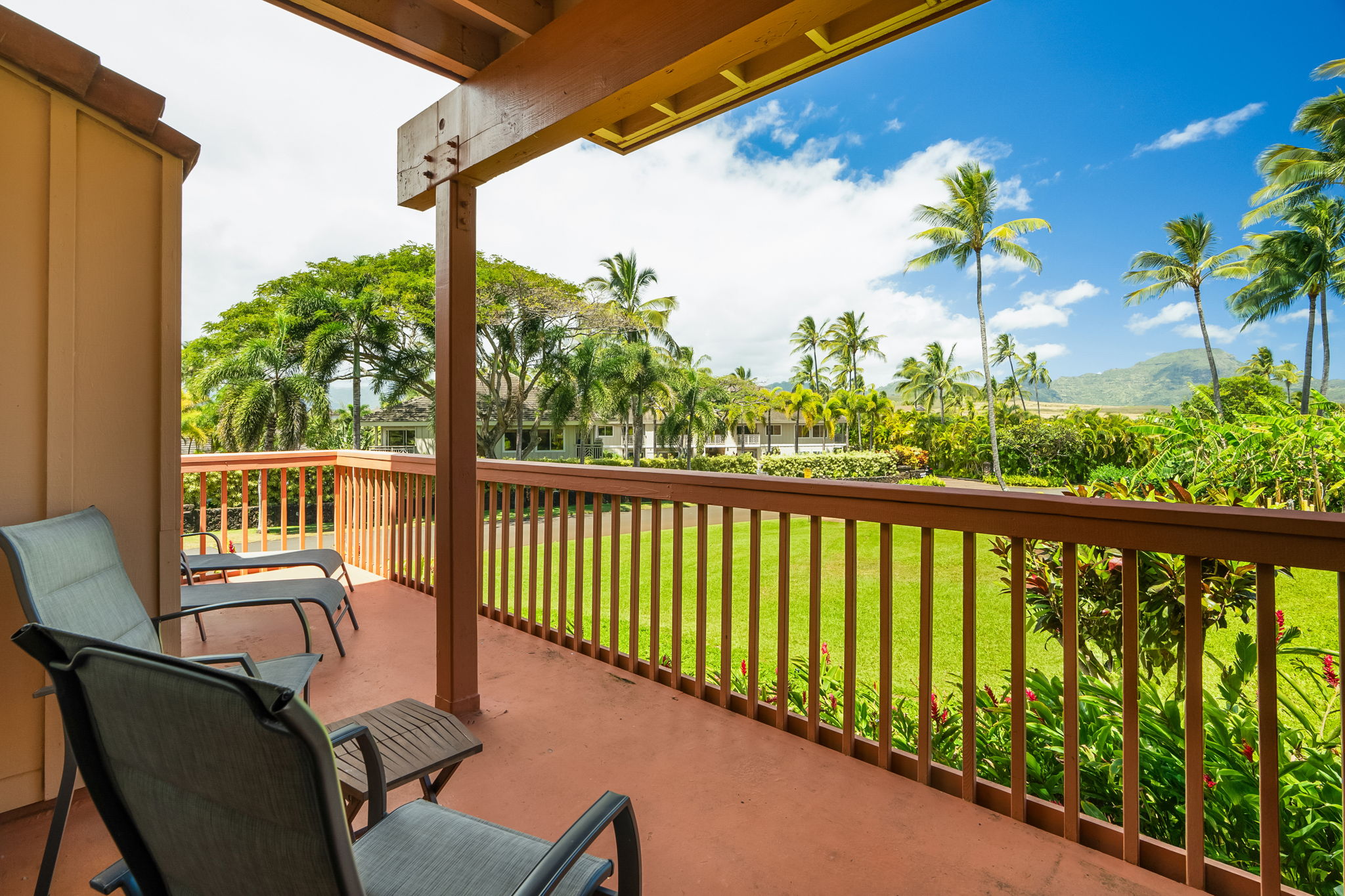 2370 Ho'ohu Road, Unit 712 Koloa, HI 96756 - Photo 5 of 28 a view of a chair and table in the balcony