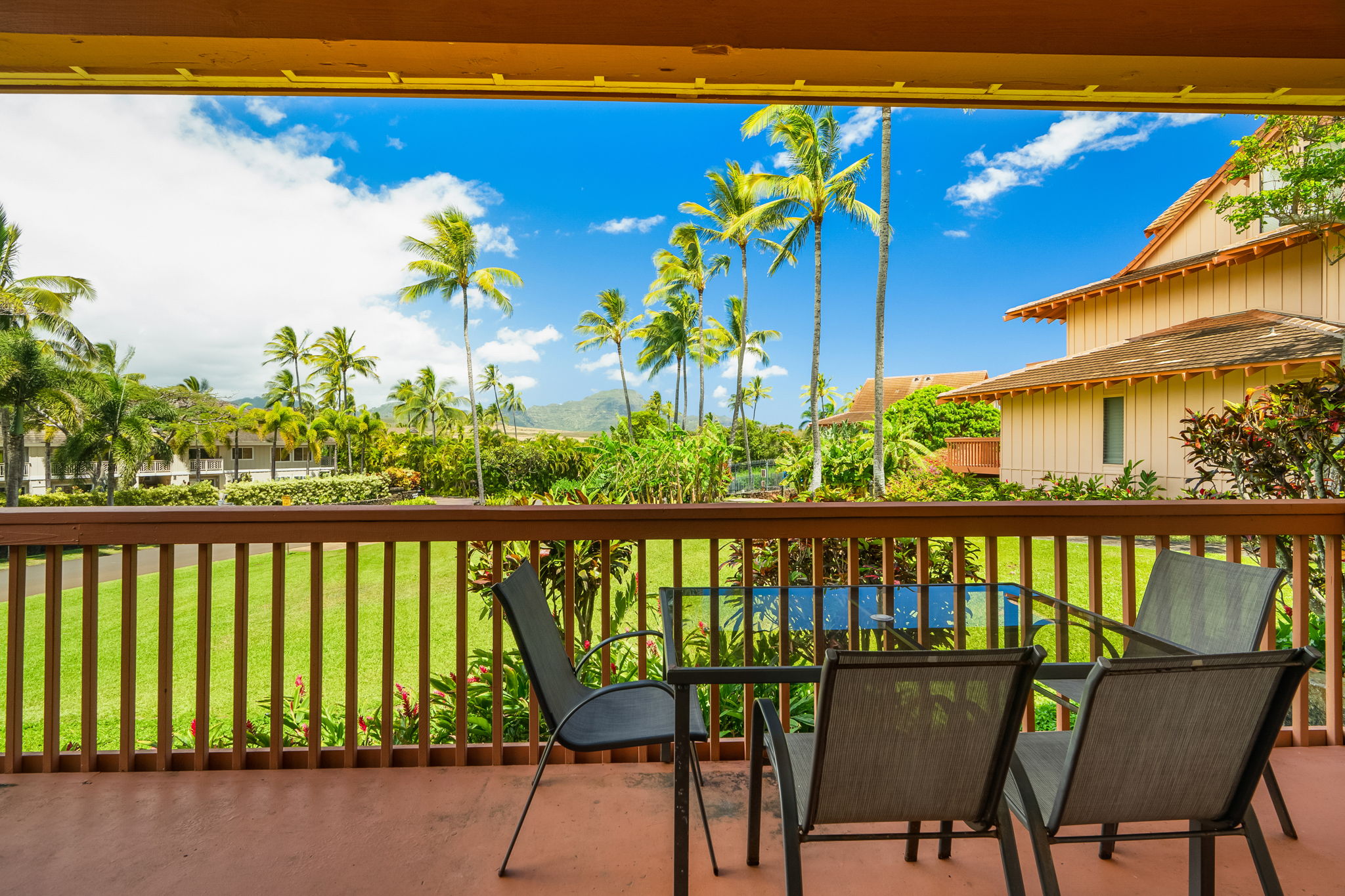 2370 Ho'ohu Road, Unit 712 Koloa, HI 96756 - Photo 6 of 28 a view of a balcony with chairs