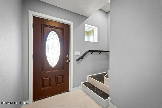 a view of a ceiling fan in a room