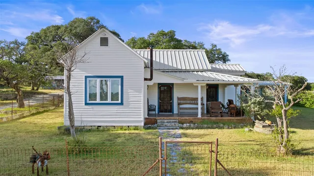 a view of pool with outdoor seating