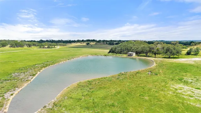 a view of a lake with a city