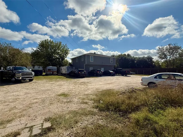 a car parked in front of a house