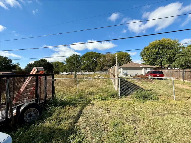 a view of a pool with an outdoor space