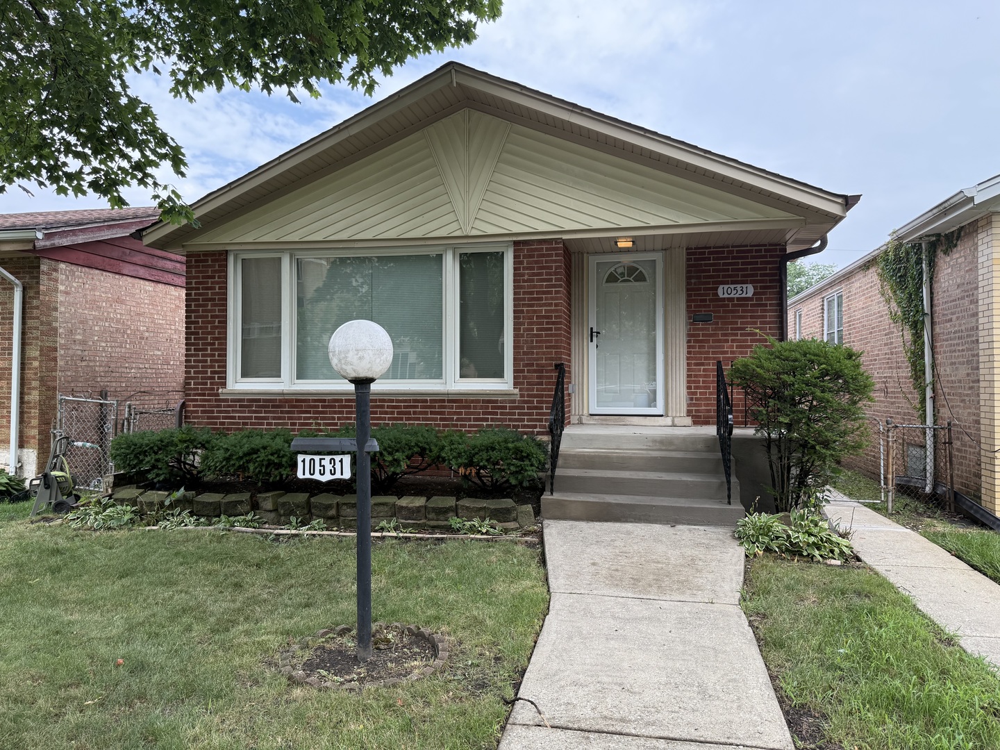 10531 South Morgan Street Chicago, IL 60643 - Photo 1 of 50 a front view of a house with garden