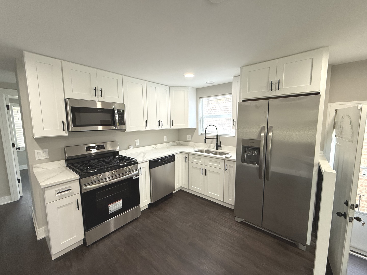 10531 South Morgan Street Chicago, IL 60643 - Photo 26 of 50 a kitchen with a stove a sink and a refrigerator