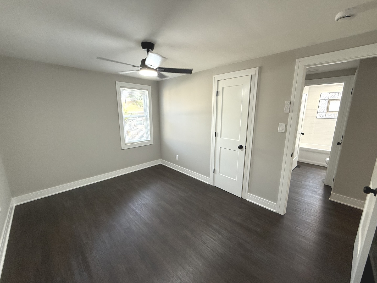 10531 South Morgan Street Chicago, IL 60643 - Photo 31 of 50 a view of an empty room with wooden floor and a window