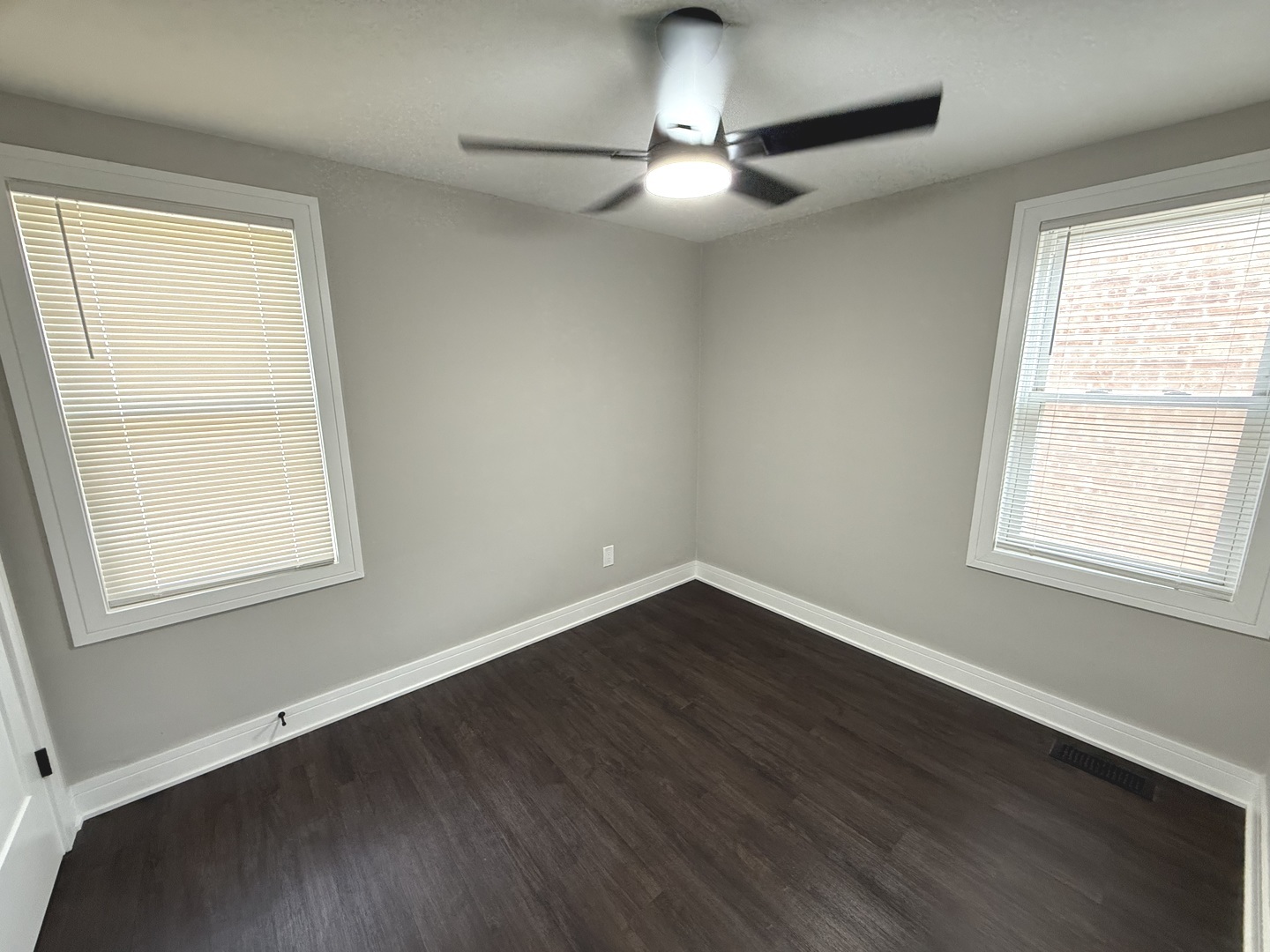 10531 South Morgan Street Chicago, IL 60643 - Photo 33 of 50 a view of an empty room with wooden floor and a window