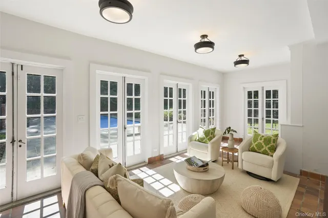 a living room with furniture and window