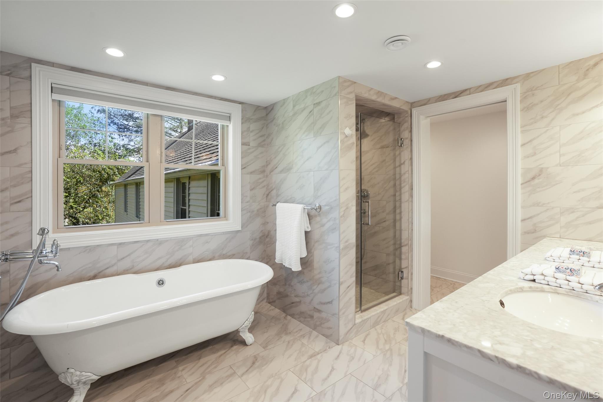 9 Oregon Road Bedford Corners, NY 10549 - Photo 17 of 35 a bathroom with a bathtub and a sink