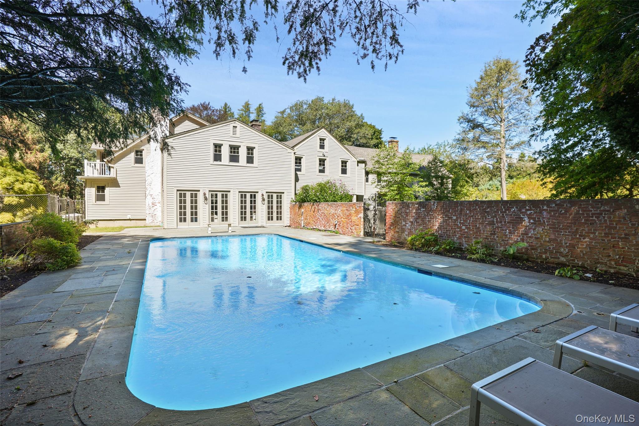 9 Oregon Road Bedford Corners, NY 10549 - Photo 26 of 35 a view of a white house with a yard