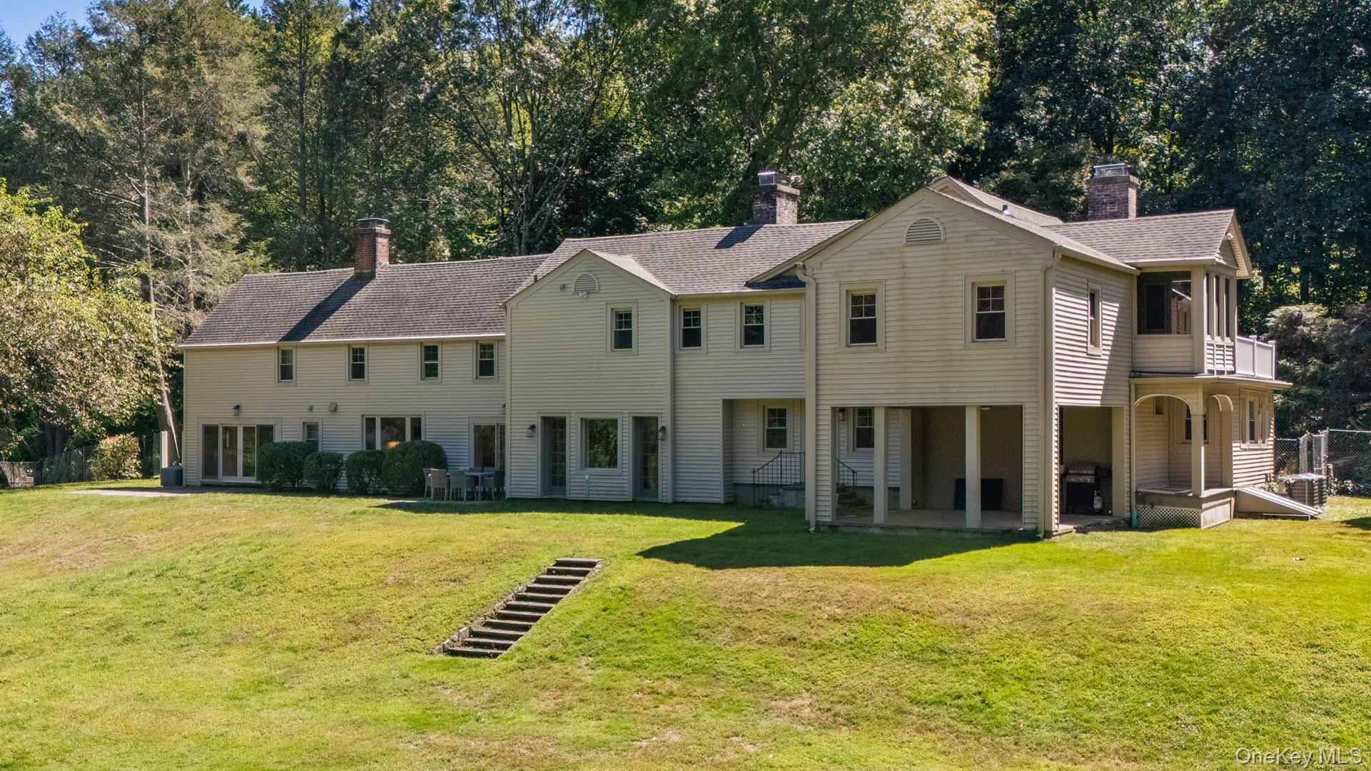 9 Oregon Road Bedford Corners, NY 10549 - Photo 28 of 35 a front view of a house with a yard