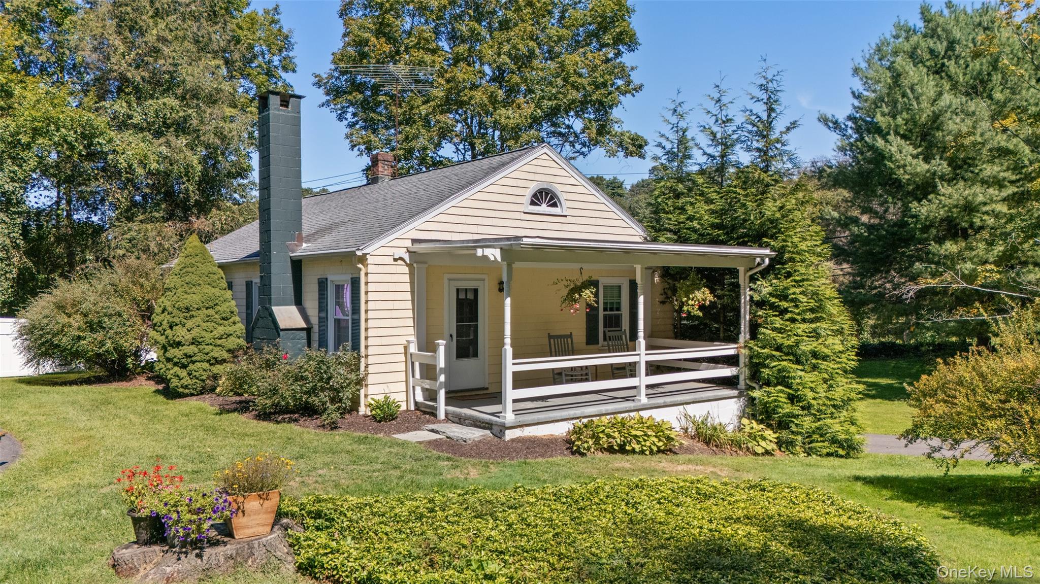 9 Oregon Road Bedford Corners, NY 10549 - Photo 29 of 35 front view of a house with a yard