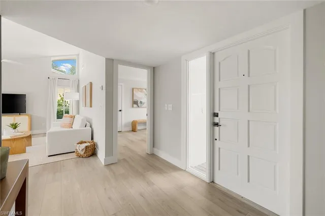 a view of livingroom with furniture and cabinet