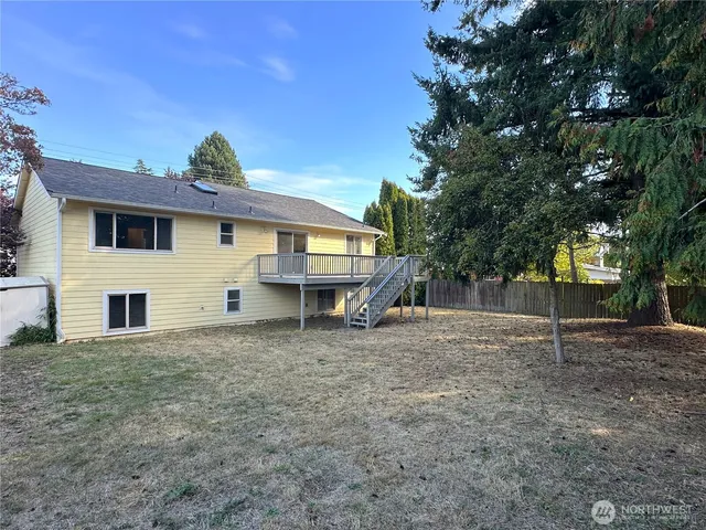 a view of deck with wooden floor and fence
