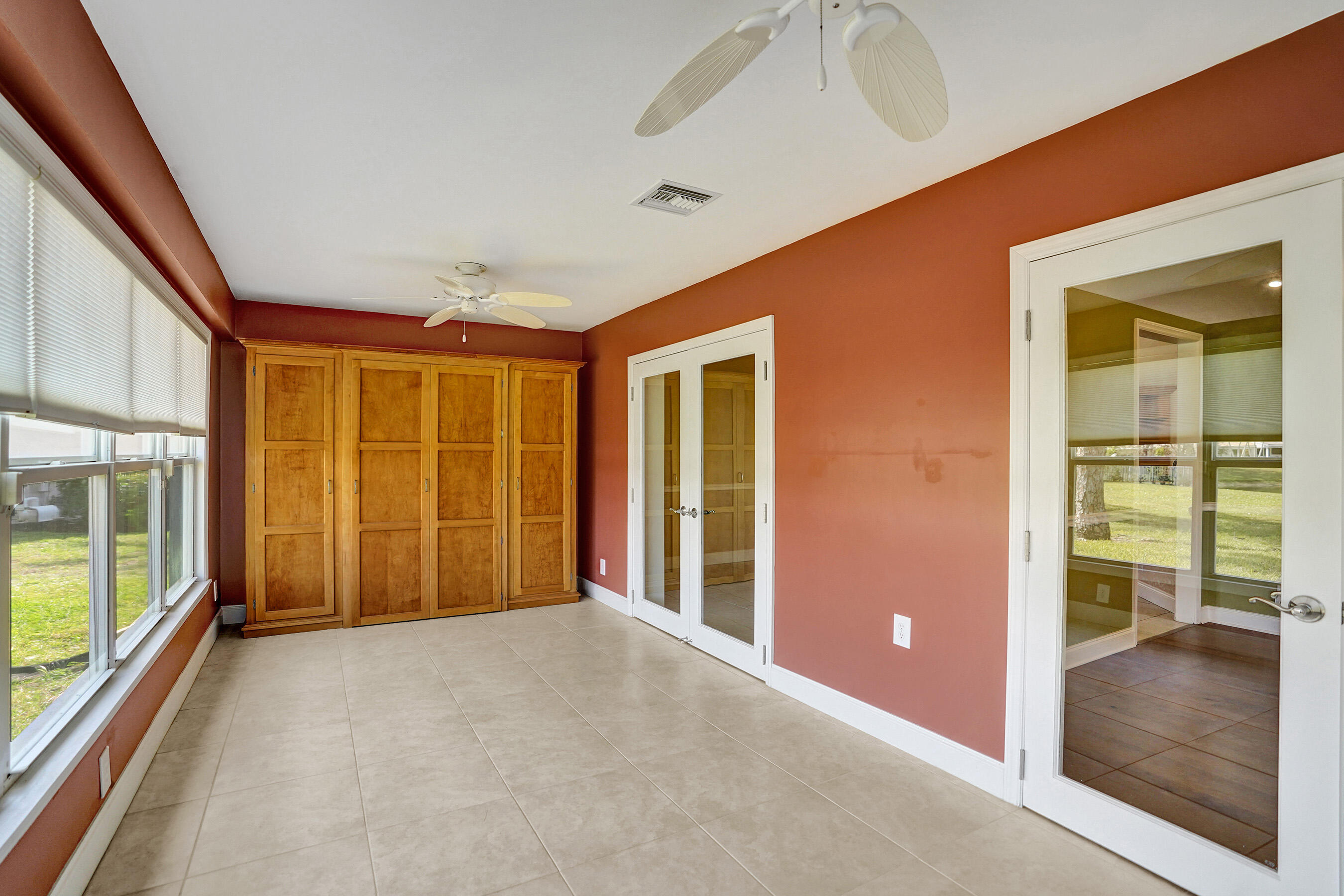 3825 Sabal Lakes Road Delray Beach, FL 33445 - Photo 13 of 33 a view of an empty room with a window