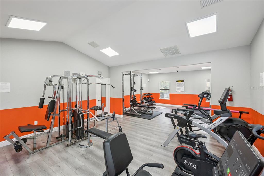 3032 Parkway Boulevard, Unit 305 Kissimmee, FL 34747 - Photo 19 of 40 a view of a room with gym equipment