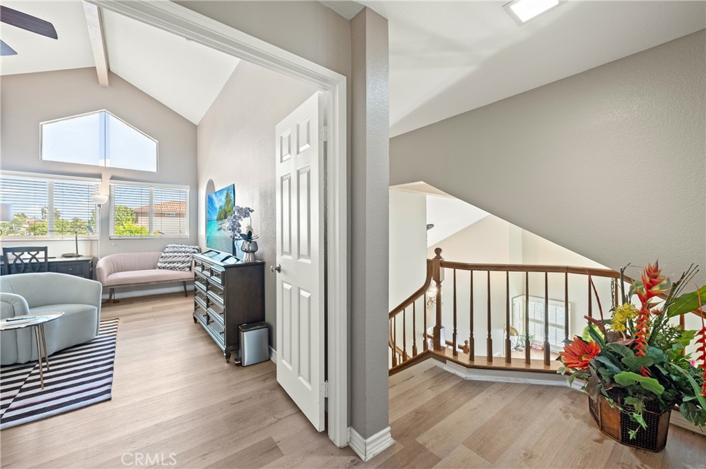 6933 Stanislaus Place Rancho Cucamonga, CA 91701 - Photo 24 of 54 a view of a livingroom with a floor to ceiling window and a couch