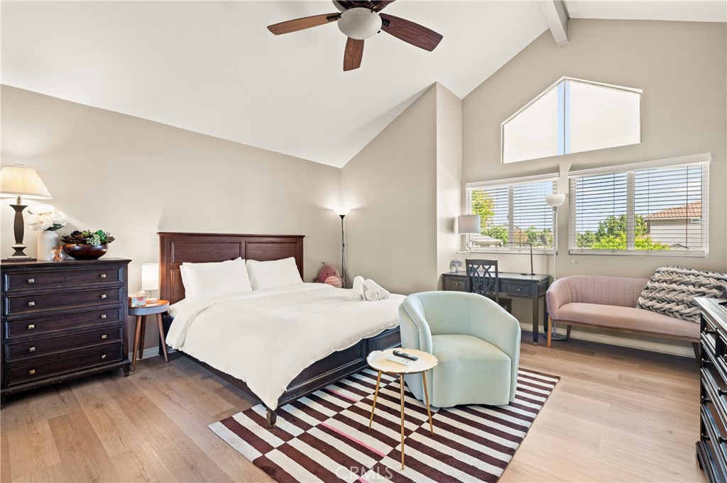 6933 Stanislaus Place Rancho Cucamonga, CA 91701 - Photo 35 of 54 a bedroom with a bed and a couch