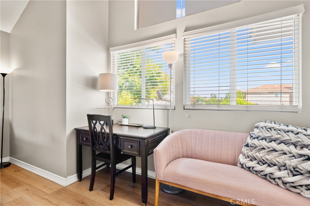 6933 Stanislaus Place Rancho Cucamonga, CA 91701 - Photo 38 of 54 a living room with furniture and a window