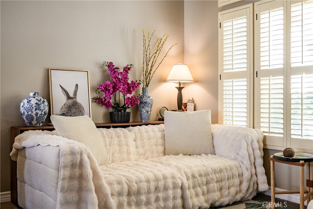 6933 Stanislaus Place Rancho Cucamonga, CA 91701 - Photo 43 of 54 a bedroom with a bed and a window