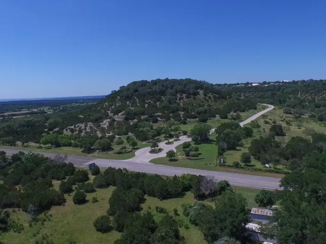 an aerial view of residential house with outdoor space