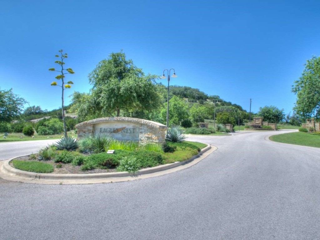 Lot 59 Eagles Ridge Burnet, TX 78611 - Photo 3 of 11 a backyard of a house with a yard and outdoor seating