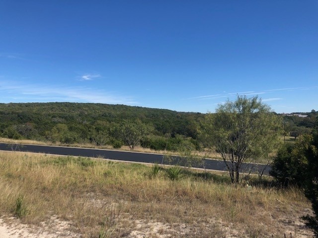 Lot 59 Eagles Ridge Burnet, TX 78611 - Photo 6 of 11 a view of a lake with a mountain in the background