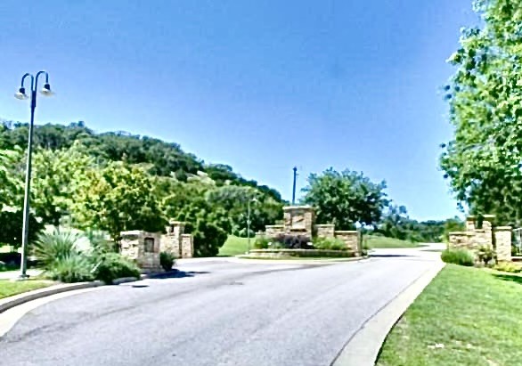Lot 59 Eagles Ridge Burnet, TX 78611 - Photo 9 of 11 a view of a street with a building and a street sign