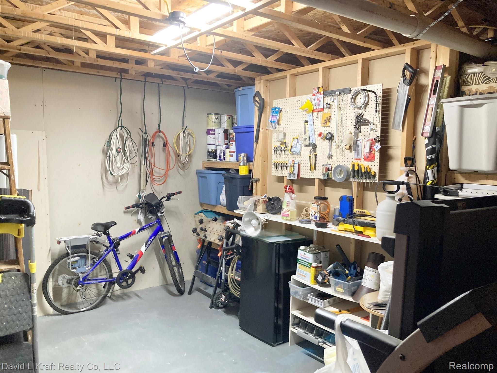 7530 Sand Road Pigeon, MI 48755 - Photo 23 of 35 7530SandBasementToolRoom.JPG