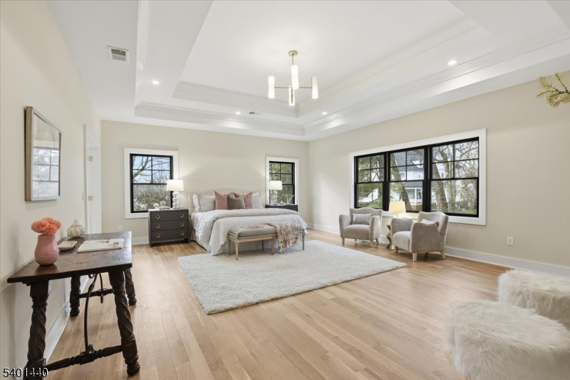 336 Fairmount Avenue Chatham, NJ 07928 - Photo 16 of 45 a bedroom with a large bed and a window