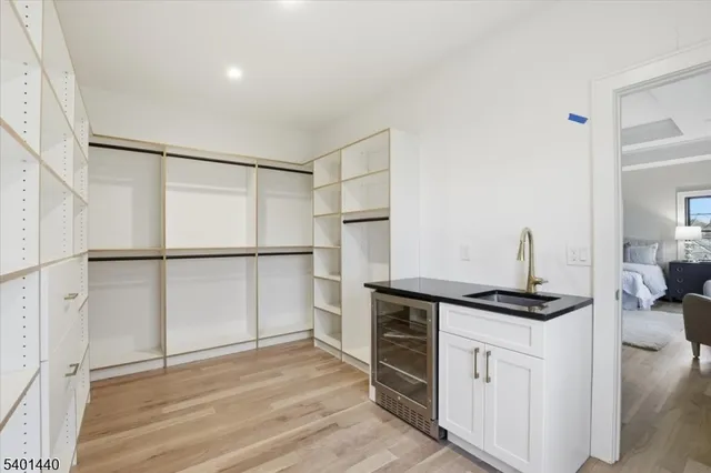 a kitchen with cabinets and window