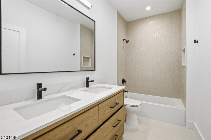 336 Fairmount Avenue Chatham, NJ 07928 - Photo 29 of 45 a bathroom with a sink a toilet and bathtub