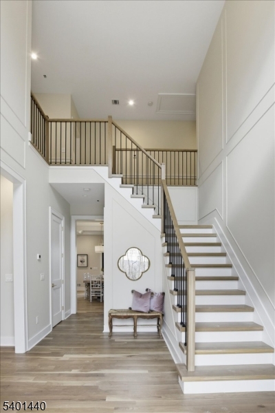 336 Fairmount Avenue Chatham, NJ 07928 - Photo 3 of 45 a view of a hallway with entryway wooden floor and front door