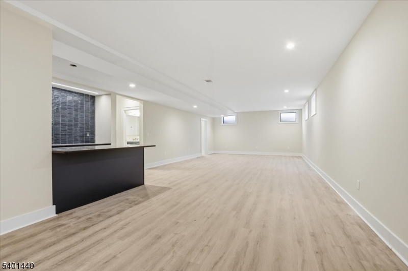 336 Fairmount Avenue Chatham, NJ 07928 - Photo 31 of 45 a view of an empty room with wooden floor