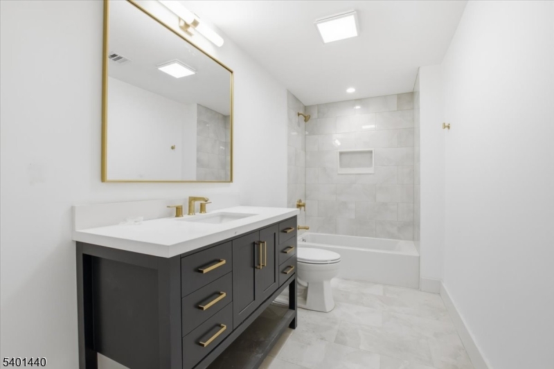 336 Fairmount Avenue Chatham, NJ 07928 - Photo 32 of 45 a bathroom with a sink a toilet and shower