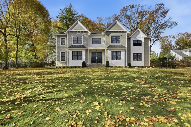 336 Fairmount Avenue Chatham, NJ 07928 - Photo 37 of 45 a front view of a house with a garden