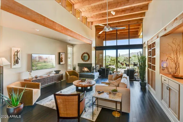 a living room with furniture and a window