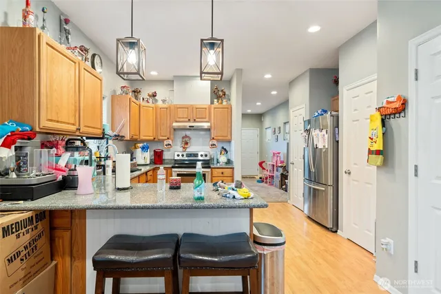 a bedroom with bed and a window