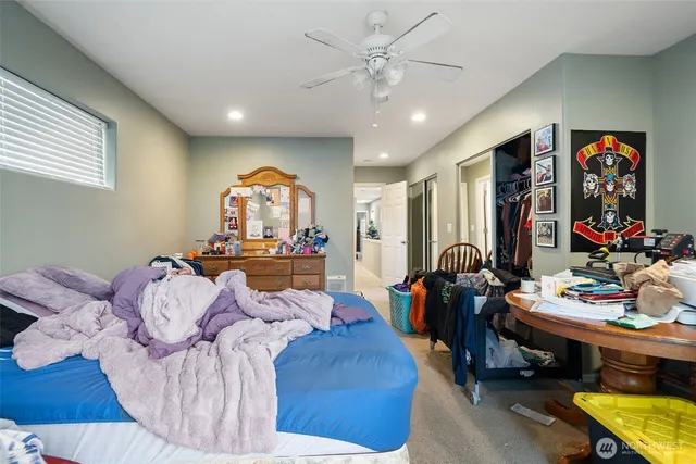 a bathroom with a sink mirror and vanity