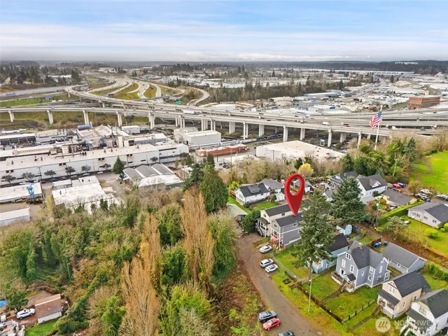 a balcony view with a black gate