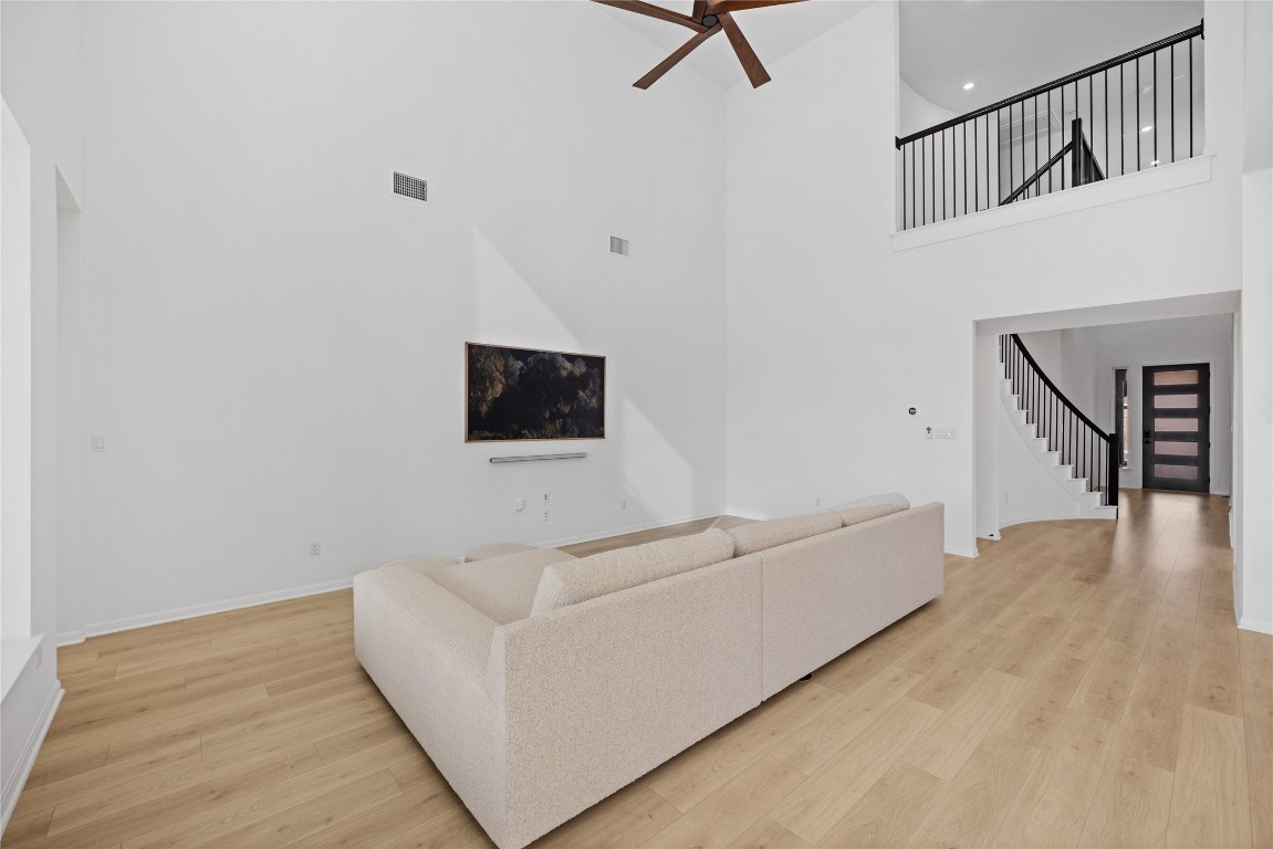 1953 Varese Path Leander, TX 78641 - Photo 5 of 36 a living room with furniture and a flat screen tv