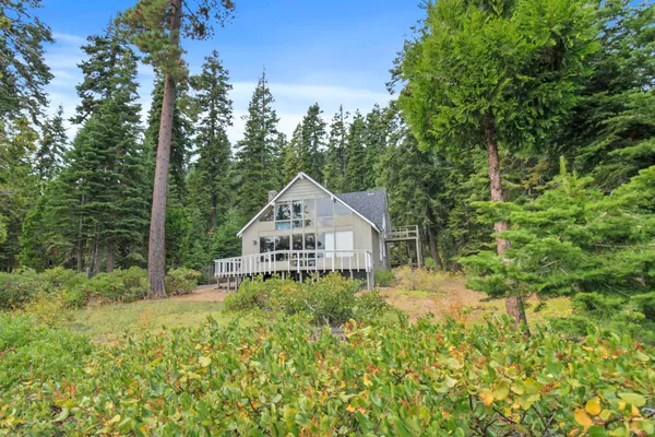 a house with trees in the background