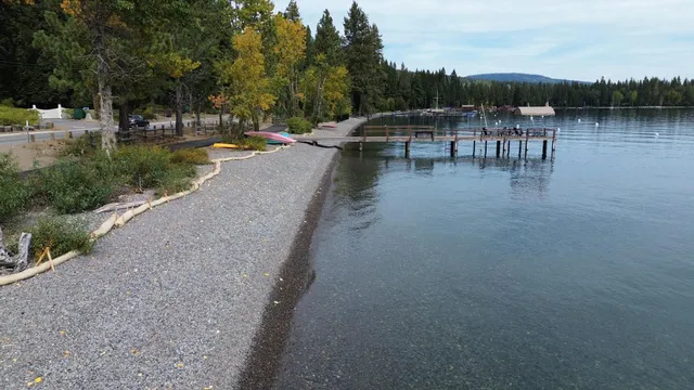 a view of a lake with sitting area