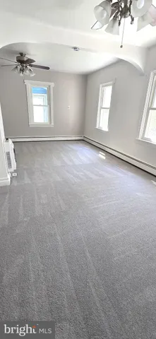 a view of small space with racks on the wall