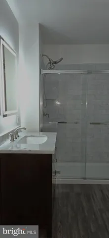 a view of a storage and utility room with washer and dryer