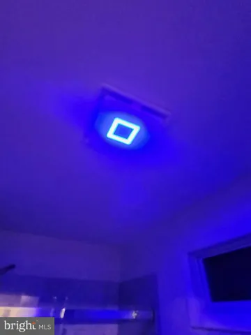 a view of a room with a wooden floor