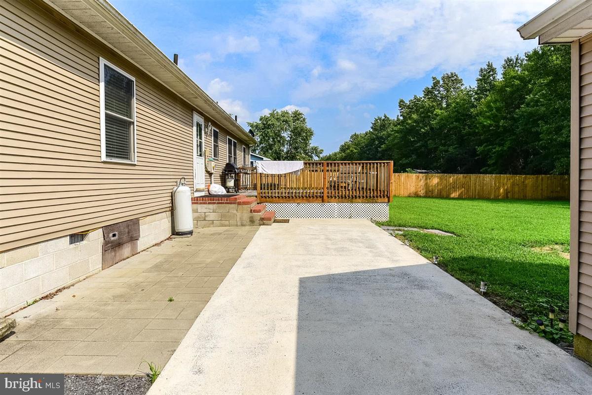 21516 Shell Station Road Frankford, DE 19945 - Photo 21 of 28 Rear Walkway from Detached Garage to House