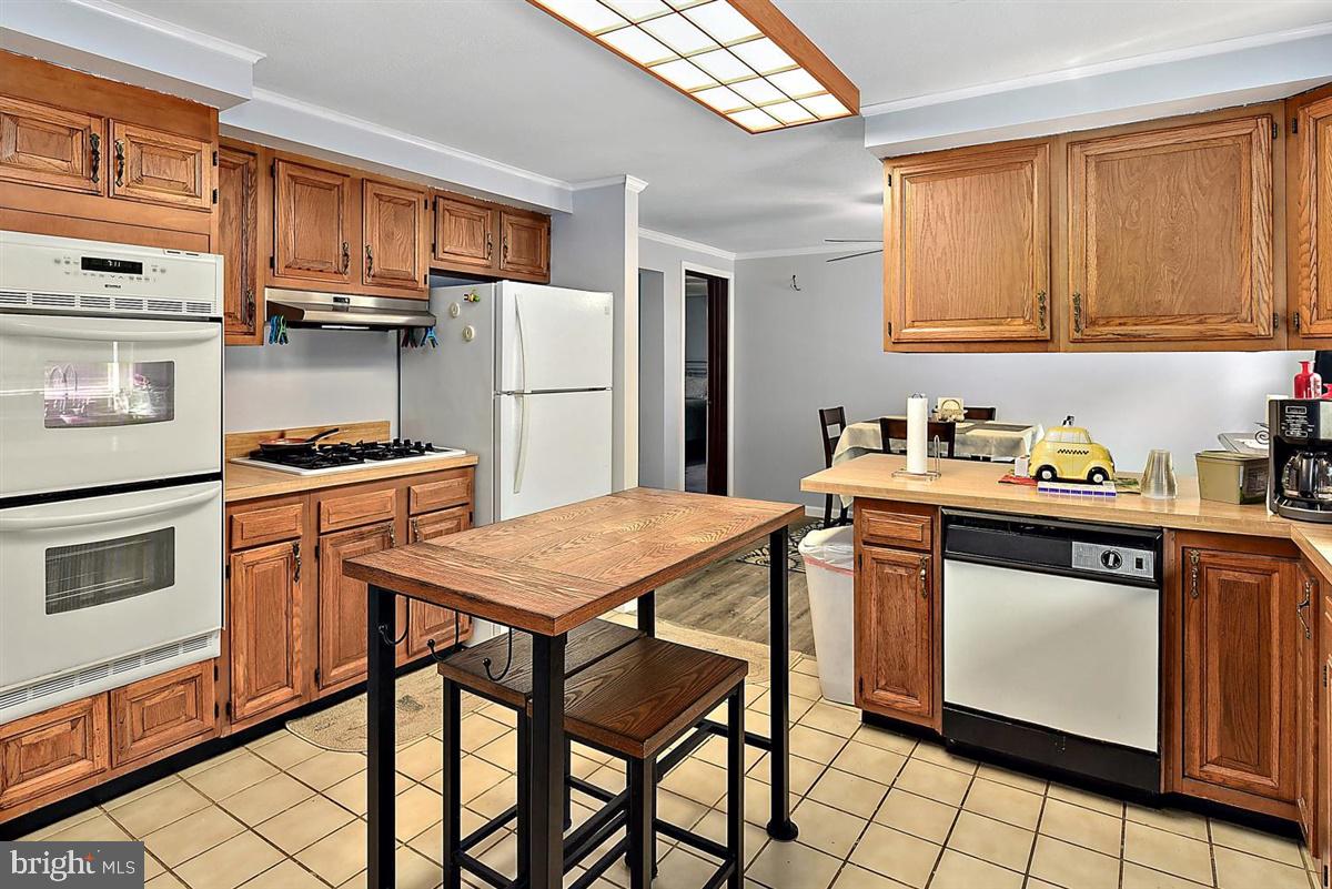 21516 Shell Station Road Frankford, DE 19945 - Photo 8 of 28 View of Kitchen from Rear Entry